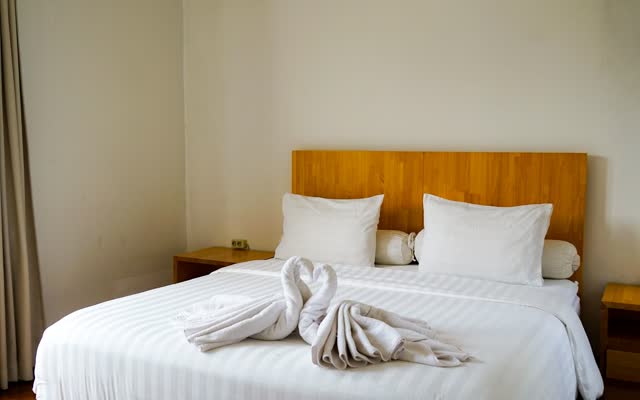Chambre confortable d'une résidence économique